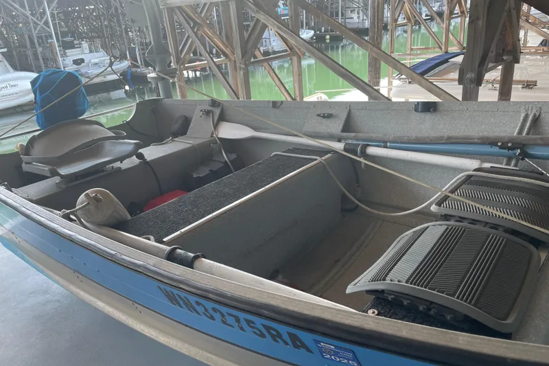 Slide: The Image of 1978 Delta Marine 43 Trawler interior view in a marina setting. - 4