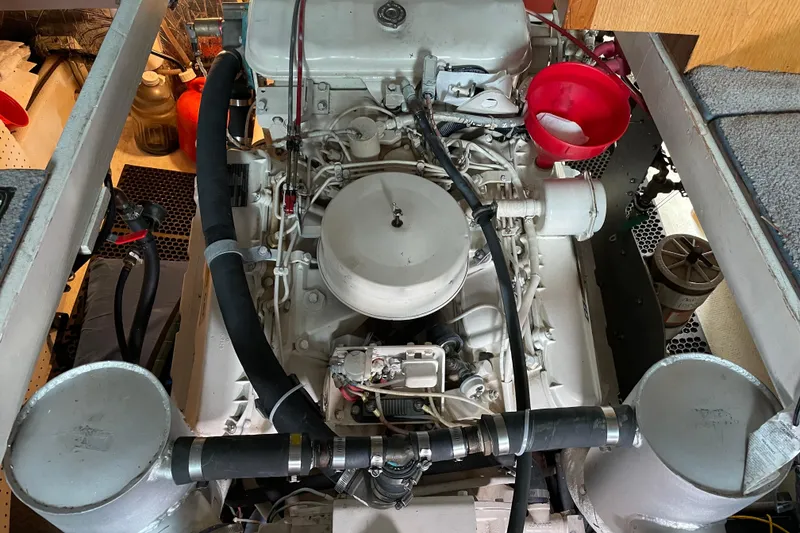 Slide: The Image of Engine room of a 1978 Delta Marine 43 Trawler, showcasing detailed machinery components. - 53