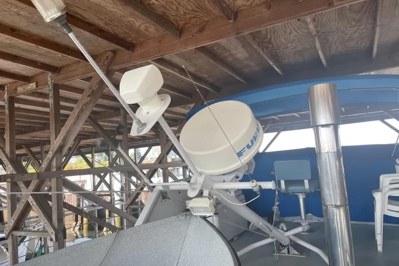 Slide: The Image of Radar equipment on a 1978 Delta Marine 43 Trawler under wooden shelter. - 6