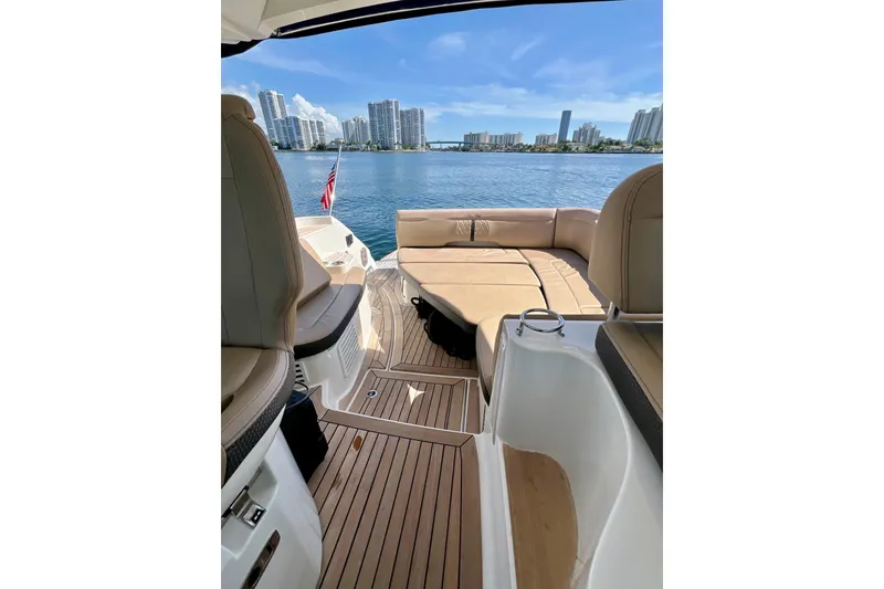 Slide: The Image of 2017 Sea Ray Sundancer 350 Coupe interior with waterfront cityscape view. - 39