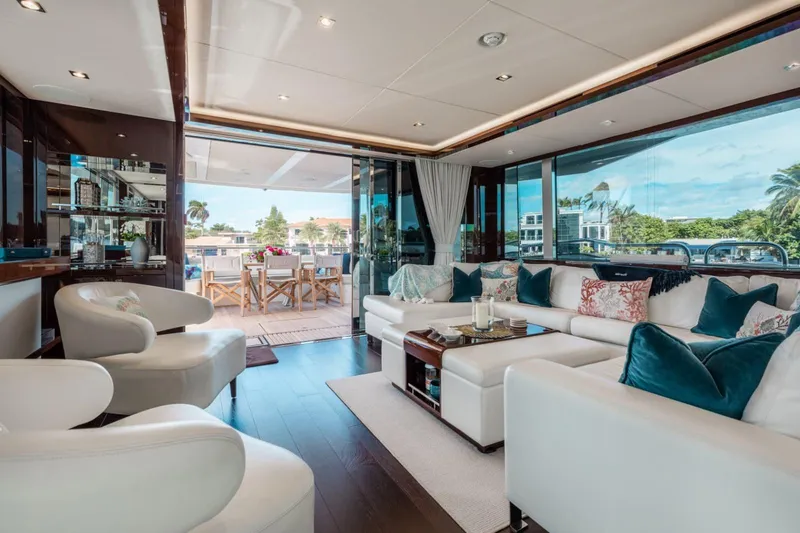 Slide: The Image of Luxurious interior of 2018 Sunseeker 95 Yacht with elegant seating and outdoor dining area. - 10