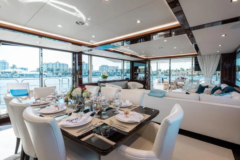Slide: The Image of Luxurious interior of 2018 Sunseeker 95 Yacht with elegant dining and seating areas. - 12