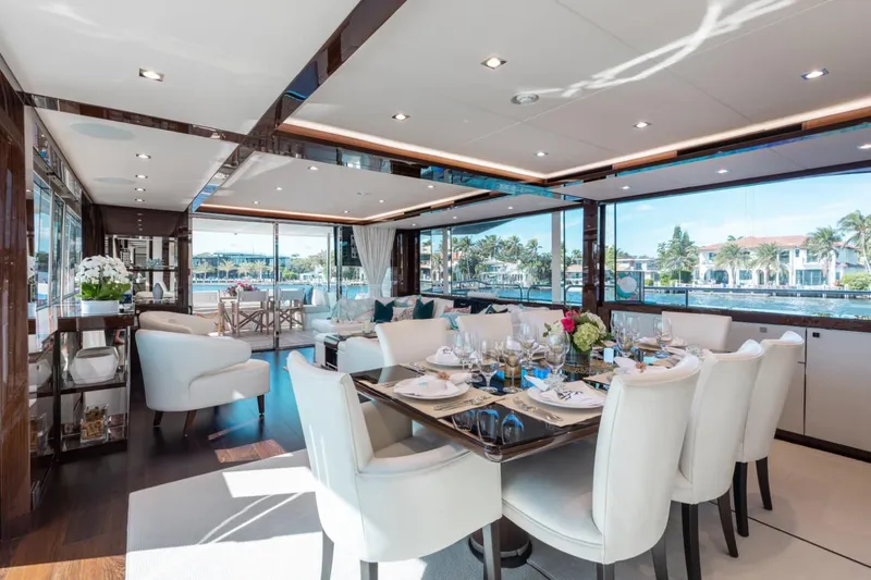 Slide: The Image of Luxurious interior of 2018 Sunseeker 95 Yacht with elegant dining area and scenic views. - 13