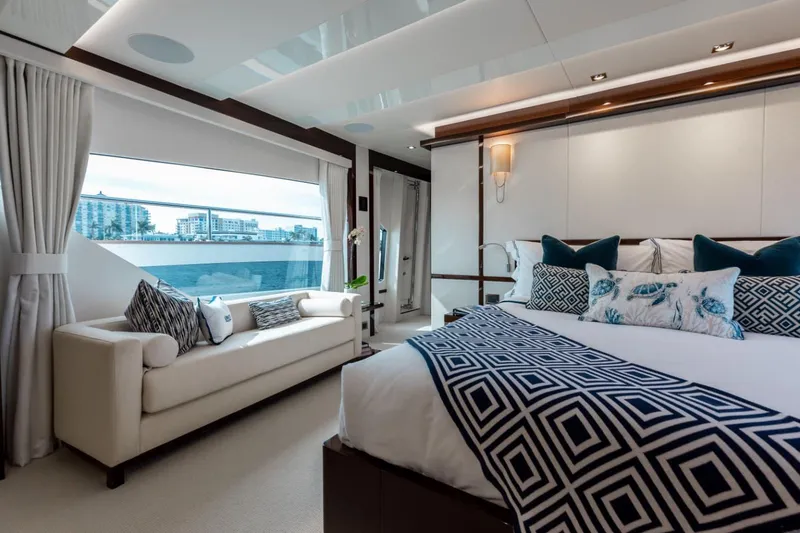 Slide: The Image of Luxurious interior of 2018 Sunseeker 95 Yacht with elegant bedroom and scenic window view. - 29