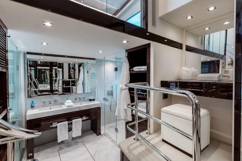 Slide: The Image of Luxurious bathroom interior of 2018 Sunseeker 95 Yacht, featuring modern fixtures and elegant design. - 30