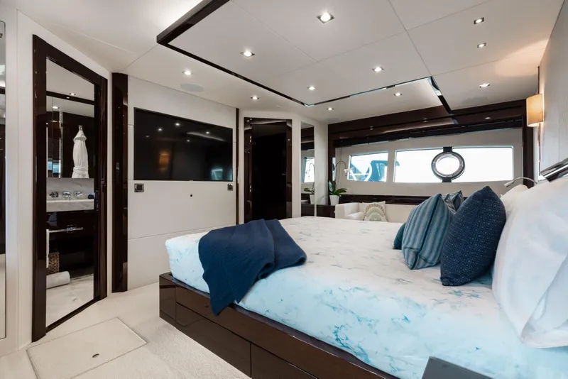 Slide: The Image of Luxurious interior of 2018 Sunseeker 95 Yacht with elegant bedroom and modern amenities. - 33