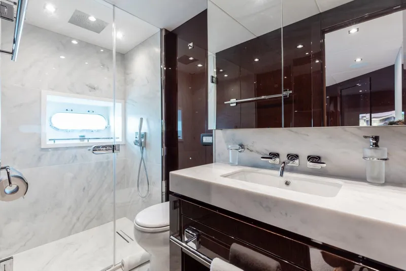 Slide: The Image of Luxurious bathroom in 2018 Sunseeker 95 Yacht with marble finishes and modern fixtures. - 39