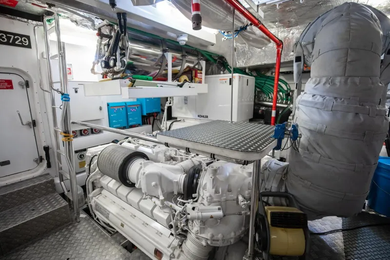 Slide: The Image of Engine room of 2018 Sunseeker 95 Yacht, featuring advanced machinery and equipment. - 49