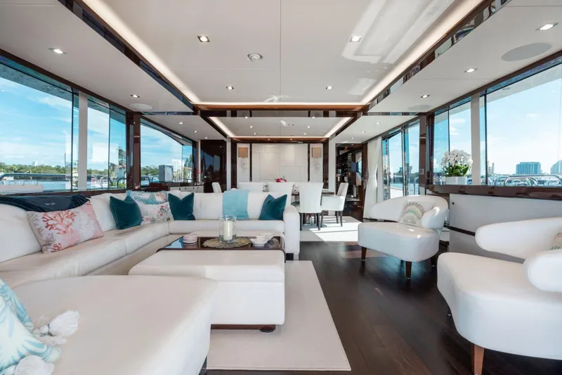 Slide: The Image of Luxurious interior of 2018 Sunseeker 95 Yacht with elegant seating and panoramic windows. - 8