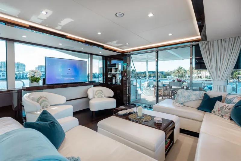 Slide: The Image of Luxurious interior of 2018 Sunseeker 95 Yacht with elegant seating and large windows. - 9