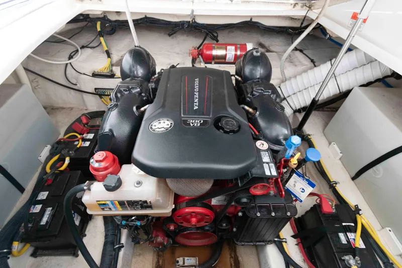 Slide: The Image of Engine compartment of a 2019 Rinker 290 EX boat with Volvo Penta V8 engine. - 10