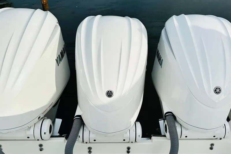 Slide: The Image of Stainless steel sink on marble countertop in 2022 Pursuit OS 355 Offshore boat. - 11