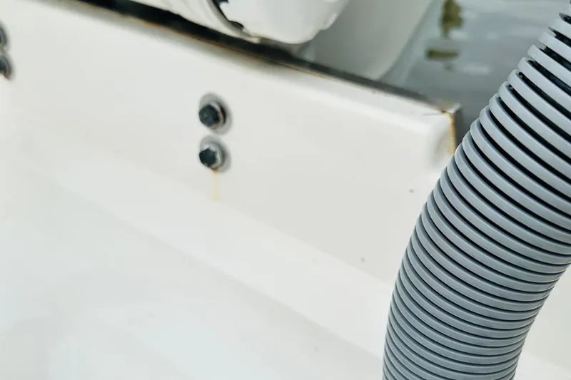 Slide: The Image of 2022 Pursuit OS 355 Offshore bathroom with modern sink and toilet. - 12