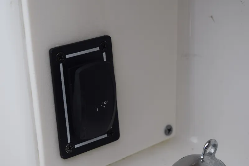 Slide: The Image of 2022 Pursuit OS 355 Offshore boat storage compartments and access hatches. - 143