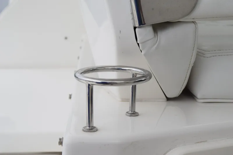 Slide: The Image of 2022 Pursuit OS 355 Offshore boat with open storage compartment and sleek design. - 196