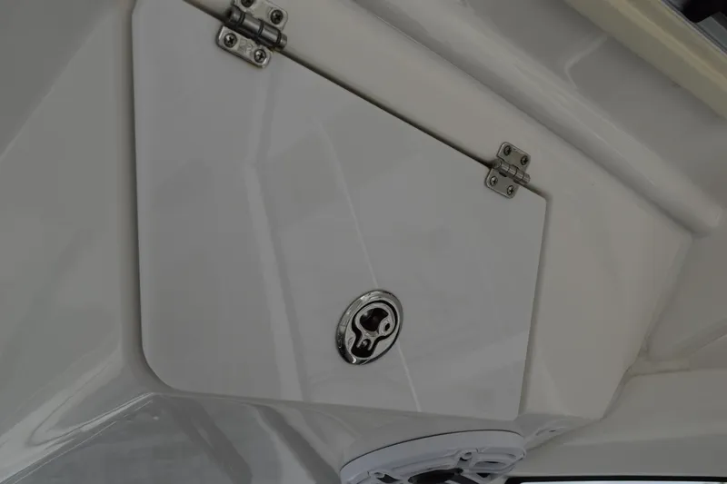 Slide: The Image of 2022 Pursuit OS 355 Offshore boat detail with warning label and stainless steel trim. - 244