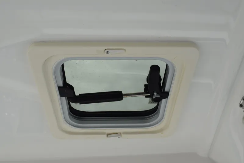 Slide: The Image of White leather seat detail on 2022 Pursuit OS 355 Offshore boat. - 256