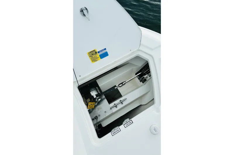 Slide: The Image of 2022 Pursuit OS 355 Offshore boat deck detail with fuel cap and seating. - 29