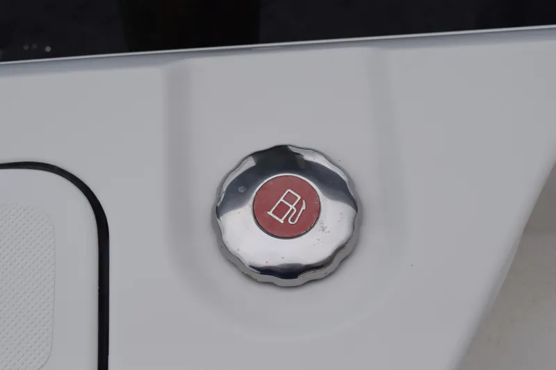 Slide: The Image of 2022 Pursuit OS 355 Offshore boat hinge detail, showcasing stainless steel hardware. - 76