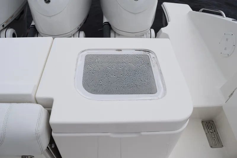 Slide: The Image of Porthole on 2022 Pursuit OS 355 Offshore boat, showcasing sleek design. - 84