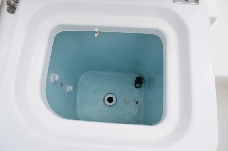 Slide: The Image of Close-up of Yamaha engine on 2022 Pursuit OS 355 Offshore boat. - 88