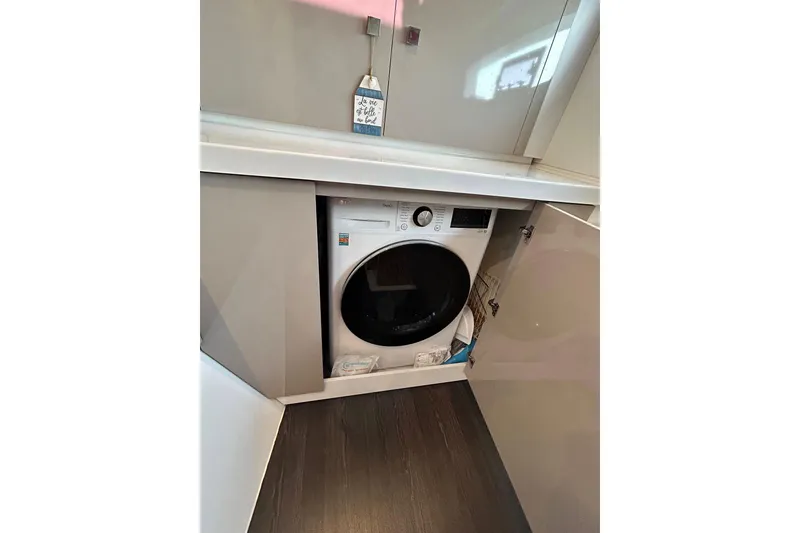 Slide: The Image of Washing machine inside a cabinet on a 2022 Fountaine Pajot Astrea 42 yacht. - 14