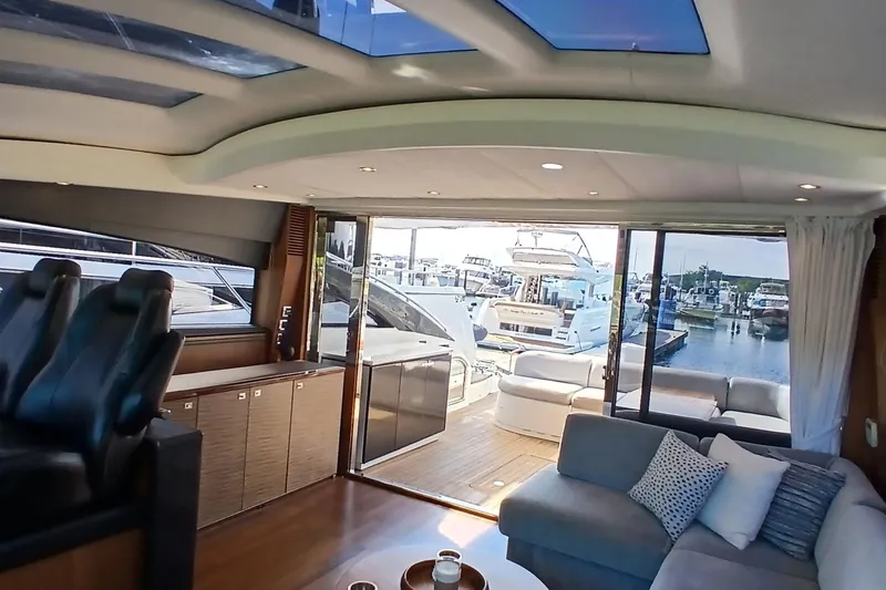 Slide: The Image of Luxurious interior of 2015 Princess V62-S yacht with leather seats and modern cabinetry. - 8