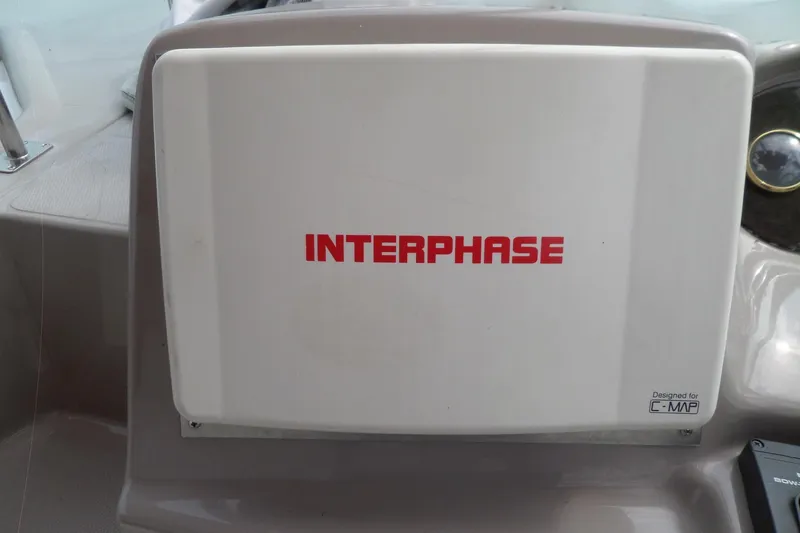 Slide: The Image of Interphase navigation system on 2003 Cruisers Yachts 3275 Express dashboard. - 24