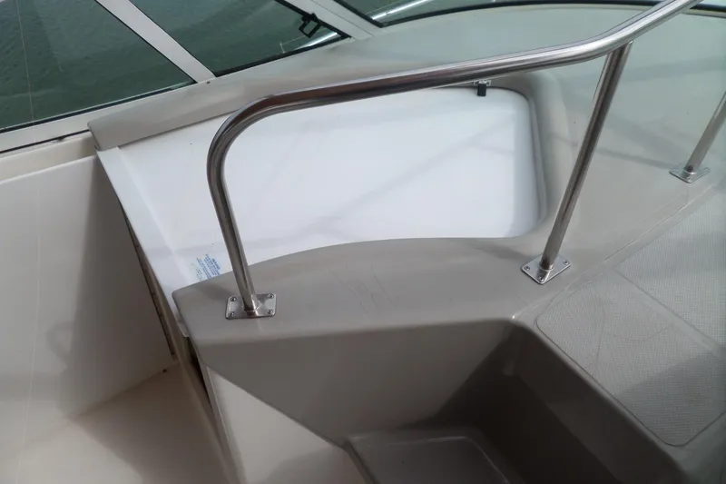 Slide: The Image of 2003 Cruisers Yachts 3275 Express boat interior with stainless steel railing. - 29
