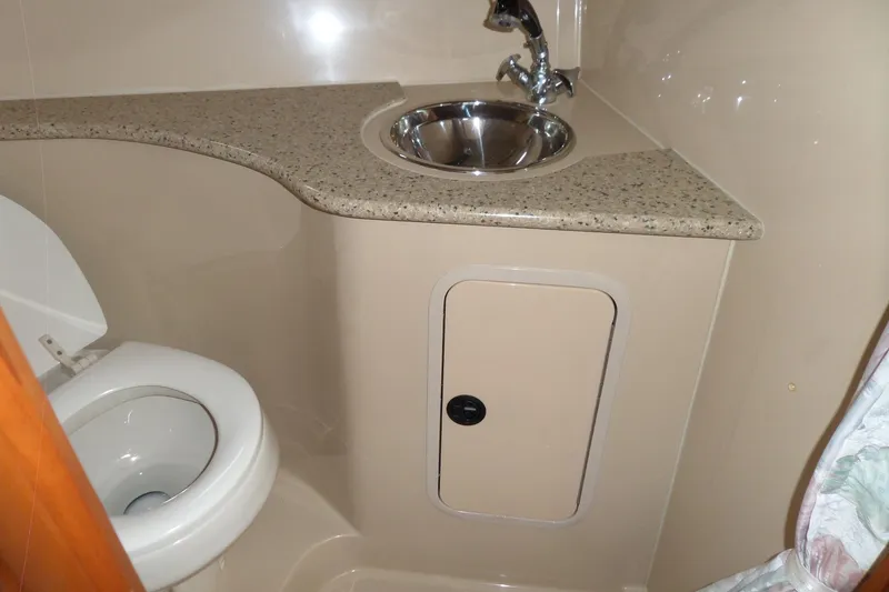 Slide: The Image of 2003 Cruisers Yachts 3275 Express bathroom with sink and toilet. - 46