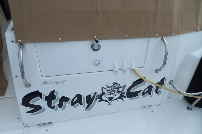 Slide: The Image of 2003 Cruisers Yachts 3275 Express with "Stray Cat" graphic on the stern. - 6