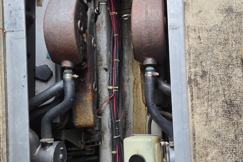 Slide: The Image of Engine components of a 1992 Luhrs Tournament 320 Convertible boat. - 21