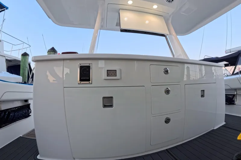 Slide: The Image of 2023 Regal 38 SAV yacht interior with sleek cabinetry and modern design. - 34