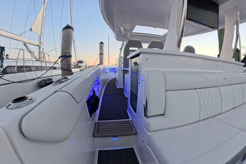 Slide: The Image of 2023 Regal 38 SAV luxury yacht interior with sleek seating and modern design. - 36