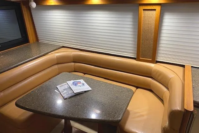 Slide: The Image of Luxurious interior of 1989 Buddy Davis 61 Sportfish with leather seating and granite table. - 11