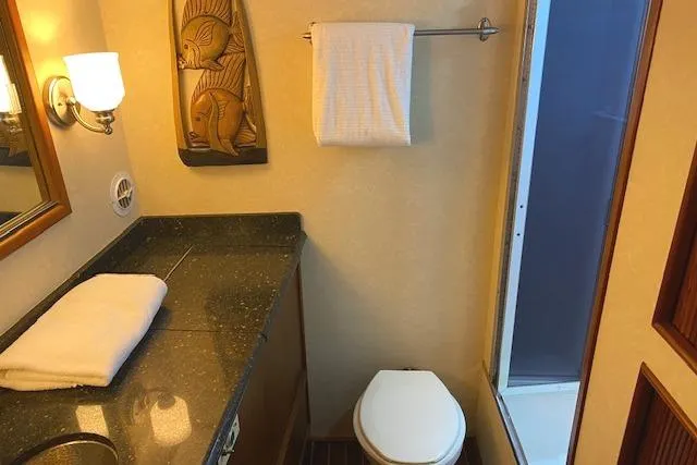 Slide: The Image of Bathroom interior of 1989 Buddy Davis 61 Sportfish yacht with shower and vanity. - 18