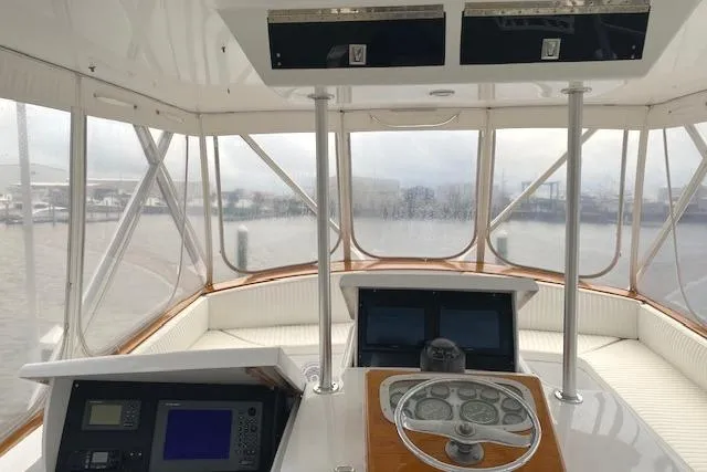 Slide: The Image of 1989 Buddy Davis 61 Sportfish helm with navigation equipment and panoramic windows. - 38