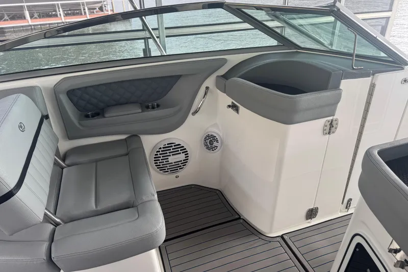 Slide: The Image of 2022 Cobalt R35 boat interior with gray seating and modern design. - 10