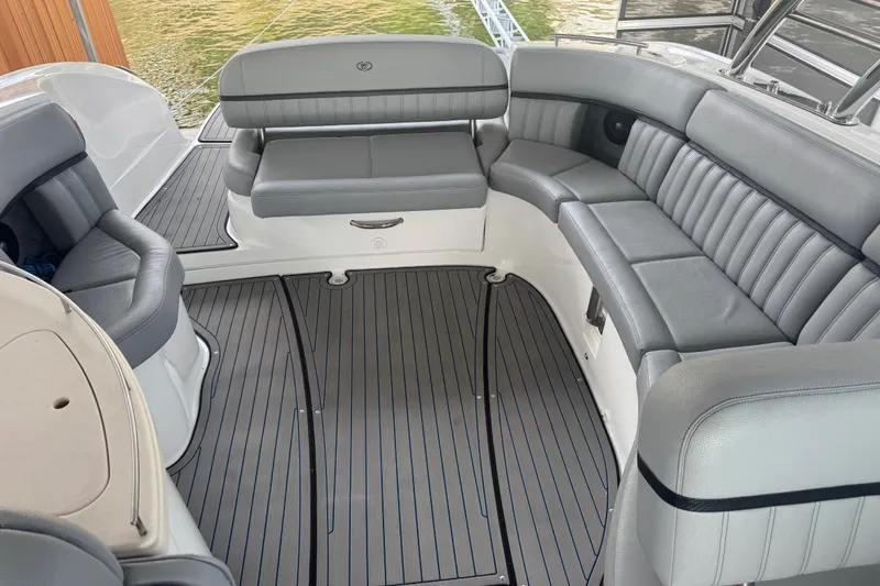 Slide: The Image of 2022 Cobalt R35 boat interior with luxurious gray seating and sleek flooring. - 13