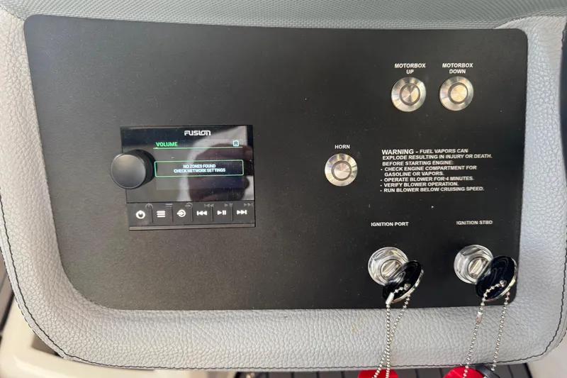 Slide: The Image of Control panel of a 2022 Cobalt R35 boat with audio and ignition features. - 25