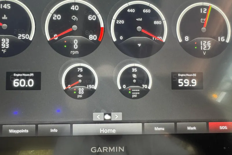 Slide: The Image of Dashboard of 2022 Cobalt R35 showing engine metrics and Garmin interface. - 9