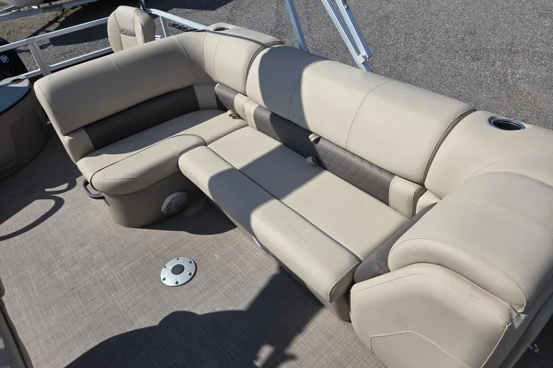 Slide: The Image of 2021 Sun Tracker Fishin' Barge 20 DLX interior seating with beige upholstery. - 10