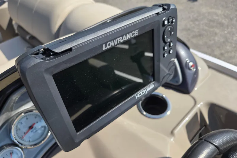 Slide: The Image of Lowrance fish finder on 2021 Sun Tracker Fishin' Barge 20 DLX dashboard. - 6