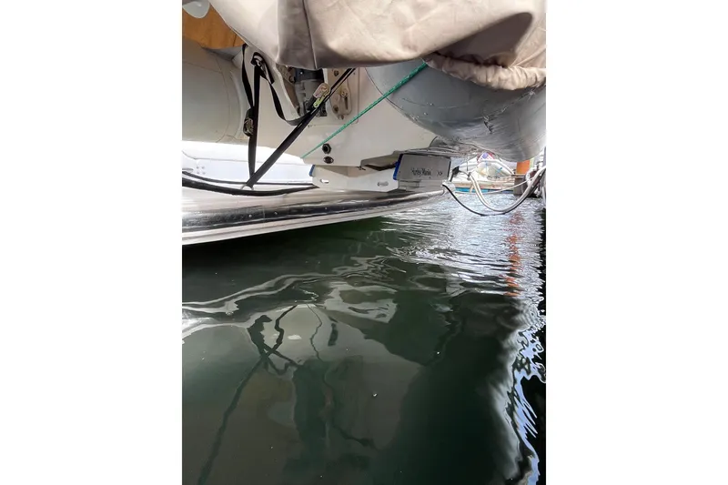 Slide: The Image of 1999 Tiara Yachts 4000 Express, docked with water reflection, partial view. - 12