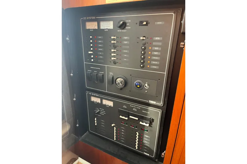 Slide: The Image of Electrical control panel of a 1999 Tiara Yachts 4000 Express boat. - 28