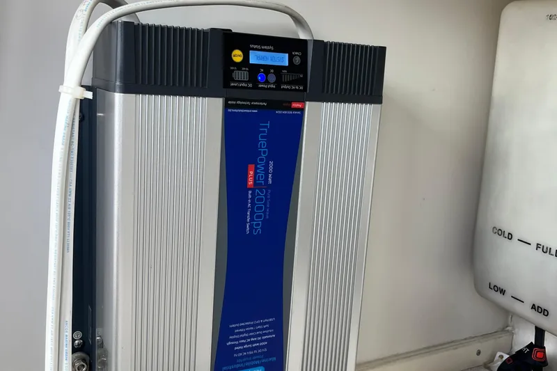 Slide: The Image of TruePower 2000PS inverter in a 1999 Tiara Yachts 4000 Express boat. - 47