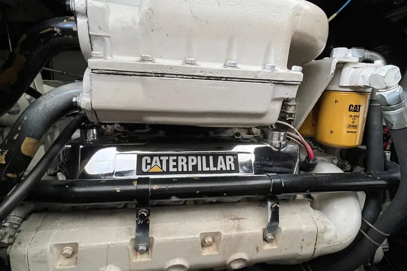 Slide: The Image of Engine of 1999 Tiara Yachts 4000 Express with Caterpillar components. - 56