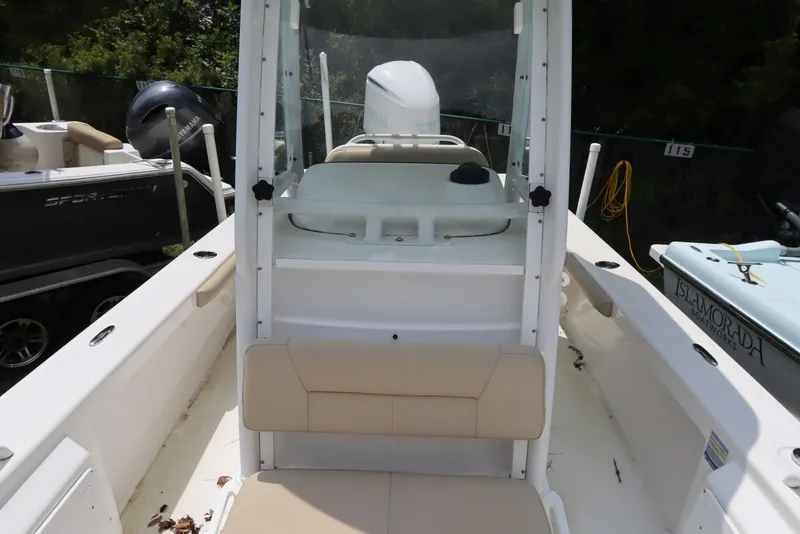 Slide: The Image of 2020 Everglades 243 Center Console boat interior with seating and console view. - 11