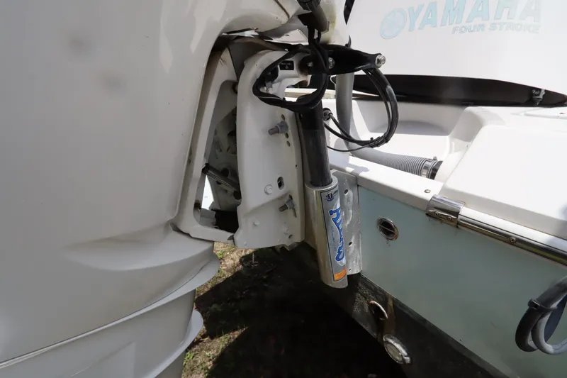 Slide: The Image of 2020 Everglades 243 Center Console boat with Yamaha four-stroke engine detail. - 24
