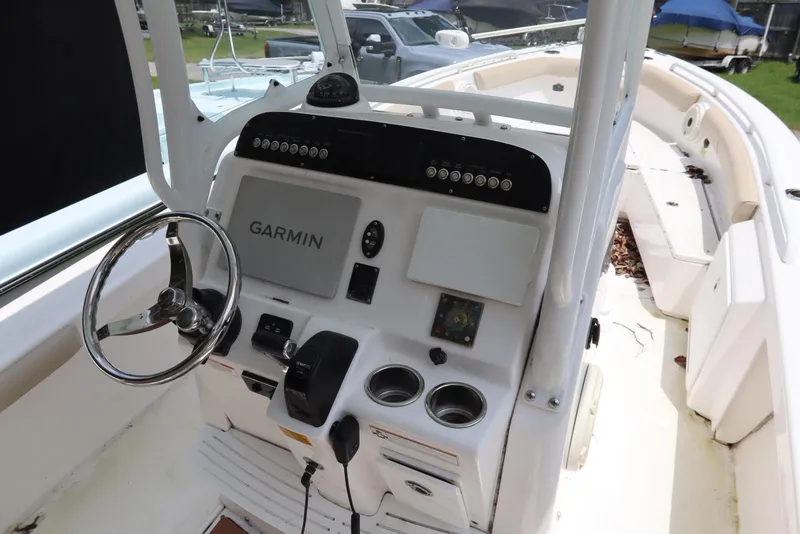 Slide: The Image of 2020 Everglades 243 Center Console boat dashboard with Garmin navigation system. - 9